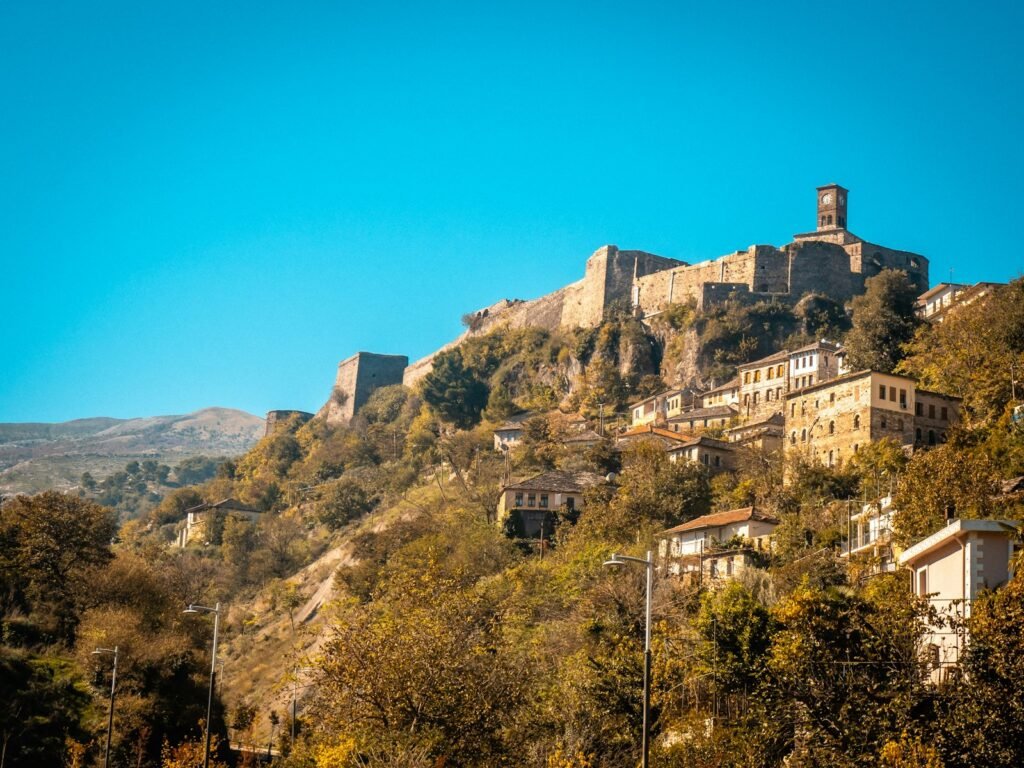 Gjirokastër castle rising above the stone-roofed old town